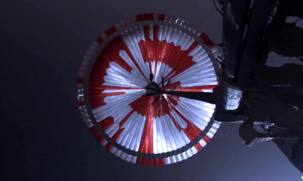 NASA Mars 2020 mission members hid a secret message in the parachute that landed Perseverance on the surface of Mars.  (Image credit: NASA TV)